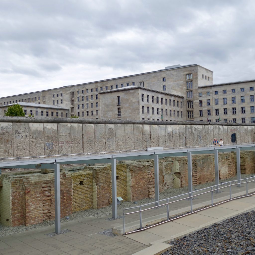 A look back from the Topography of Terror Center in Berlin towards a remaining part of the Berlin Wall