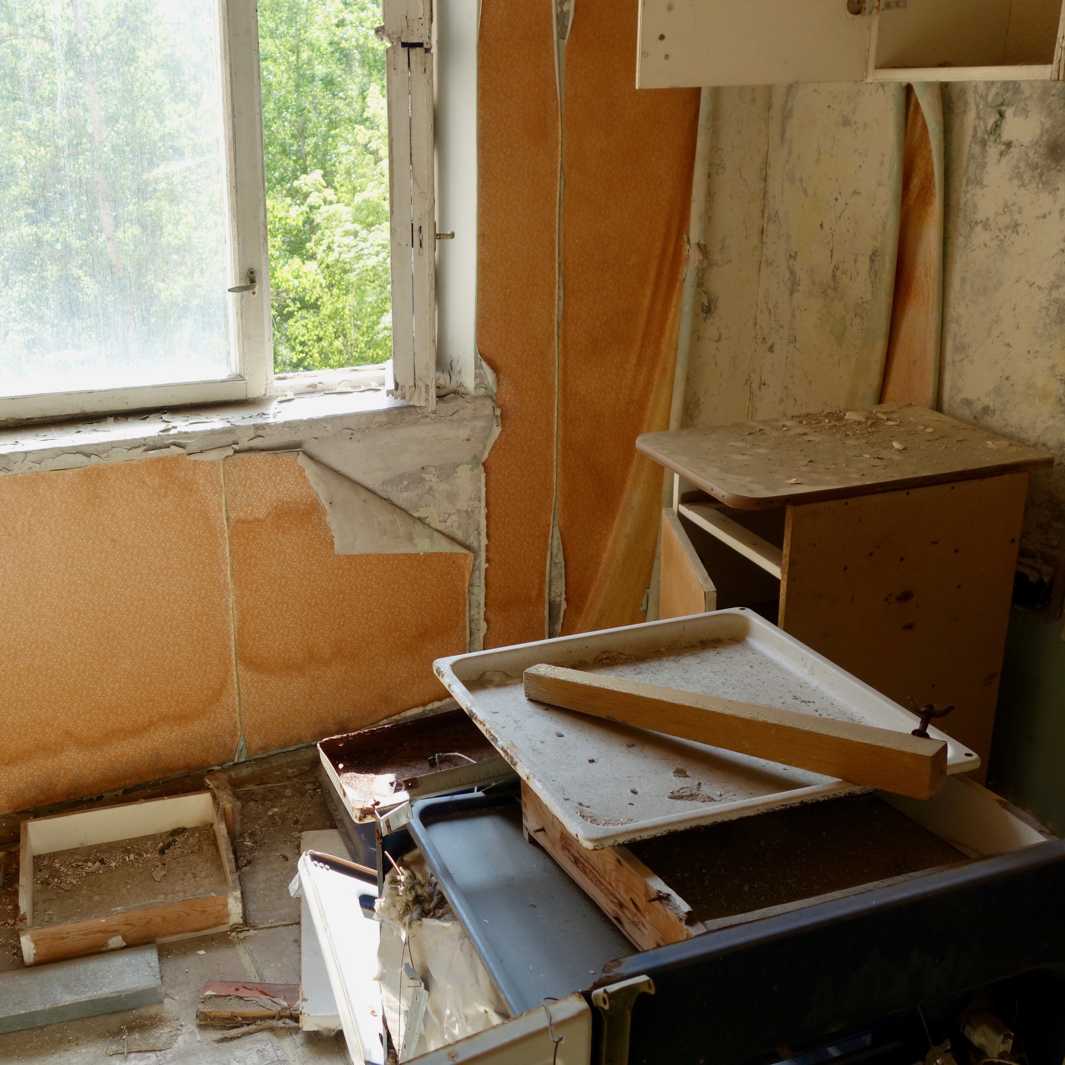 A broken down kitchen in one of the many empty apartment buildings in the ghost town of Prypriat, near Chernobyl Reactor number four which melted down and exploded in April 1986.  