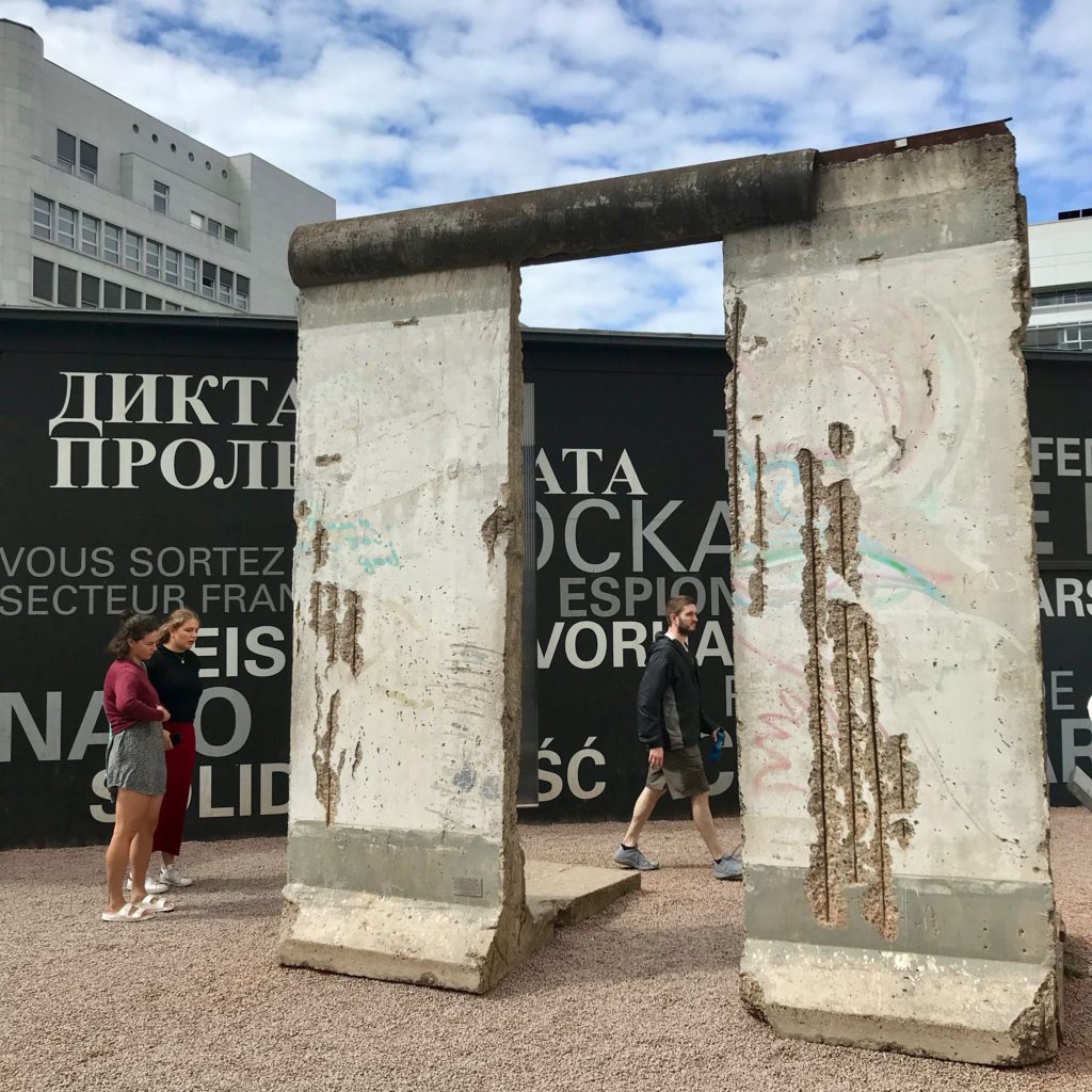 Honor the history of the past in Berlin.  A section of the Berlin Wall now used as an exhibit in the information center near former Checkpoint Charlie