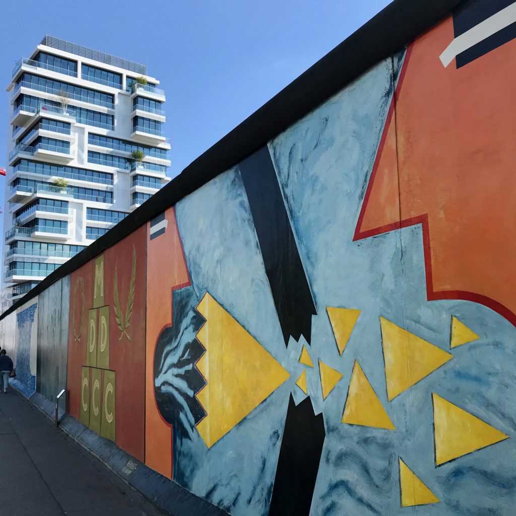 The East Side Gallery offers a canvas for art expression and hosts artists from all over the world contributing their perspective on the reunification of Germany and Berlin. Most of the murals were commissioned in 1990.
