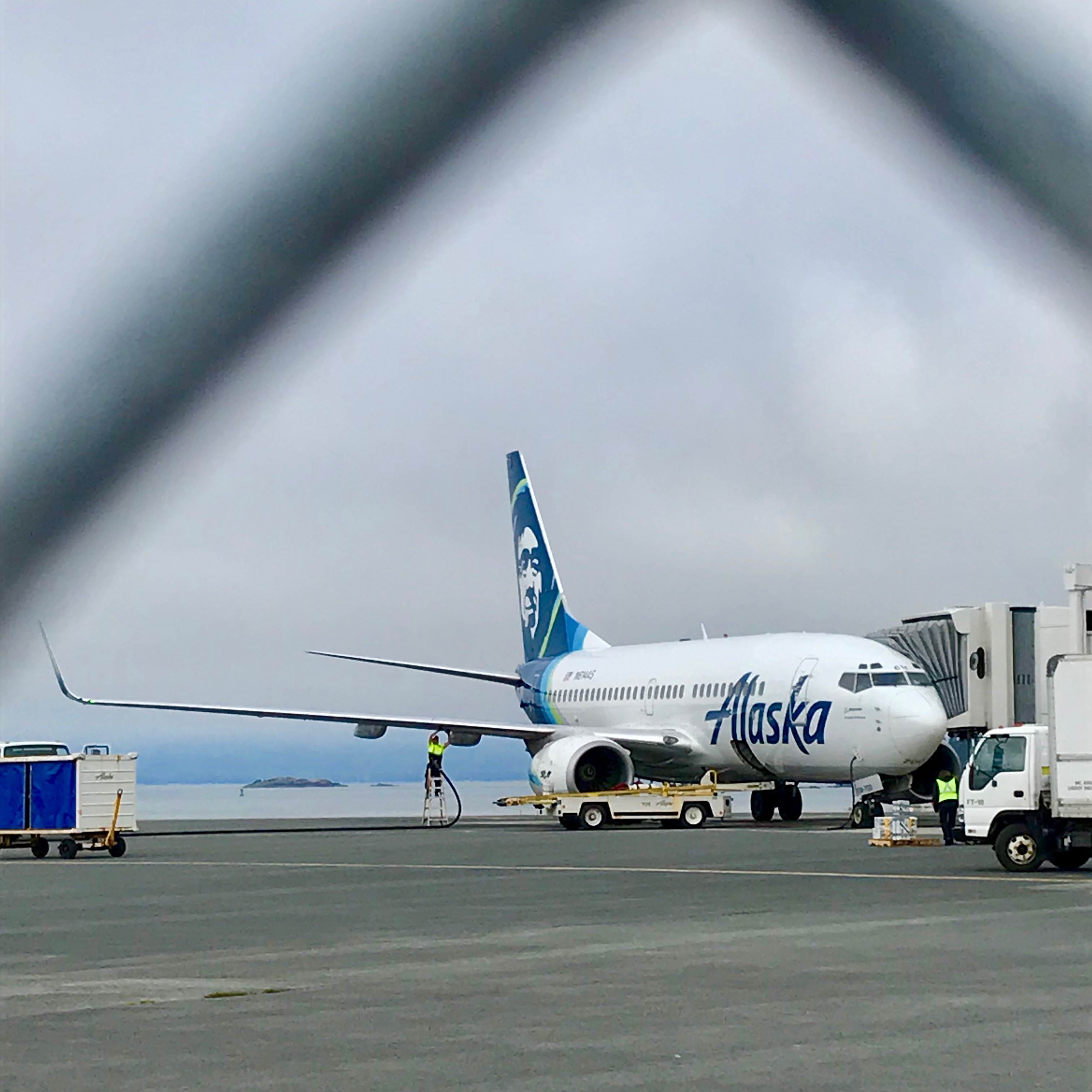 Alaska Airlines Boeing 737 getting ready for another departure.  In the summer there are two nonstop flights from Sitka to Seattle with a few other one-stop options via Ketchikan and Juneau.  In the winter the options pare down to a flight or two.  