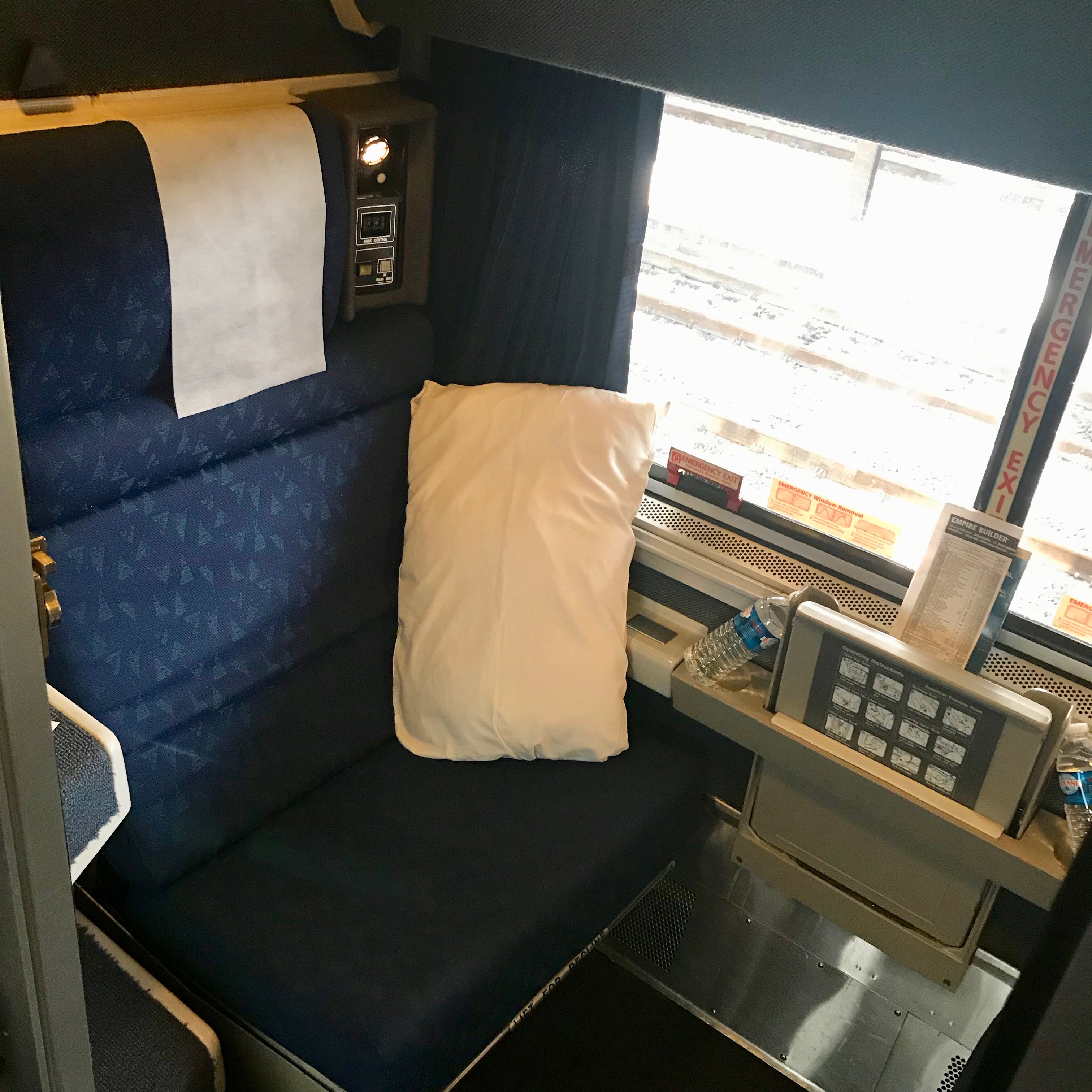 Seating in the roomette in the sleeping car of long-distance Amtrak train Empire Builder, between Seattle and Chicago. 