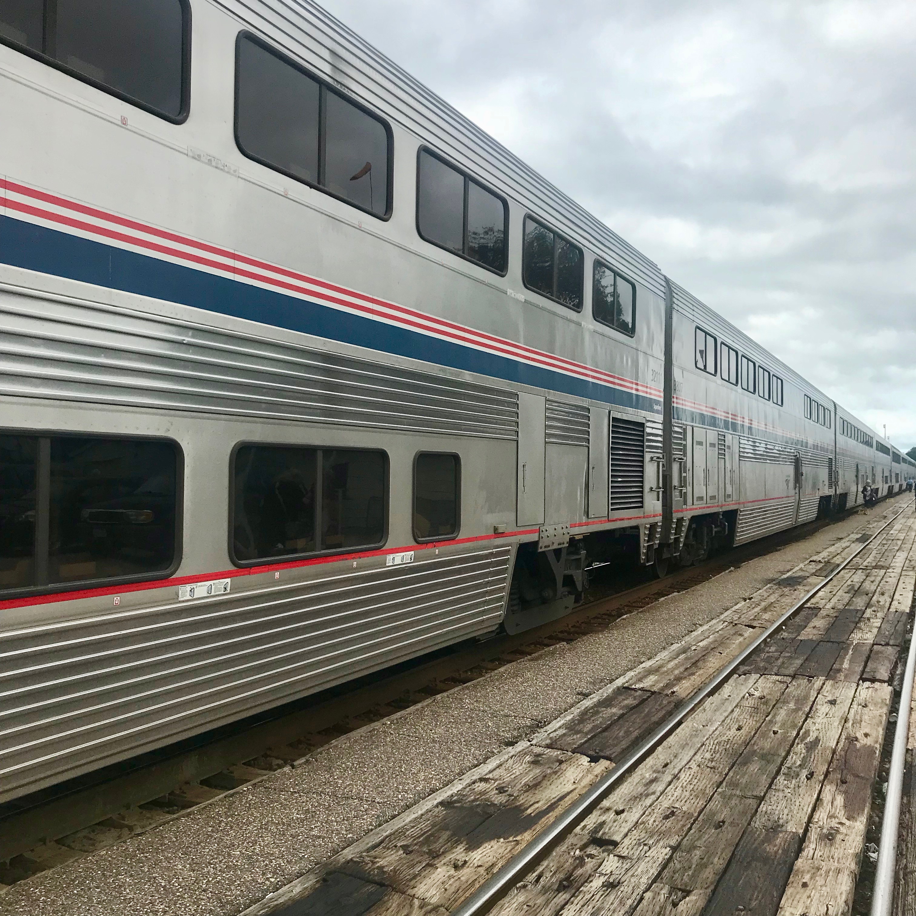 Amtrak long-distance trains that operate to/from/within the west are mostly double-decker Superliners.  There are a few seats and sleeping compartments on the lower levels, in addition to the restrooms and storage for carry-on luggage that is too bulky to take upstairs.  