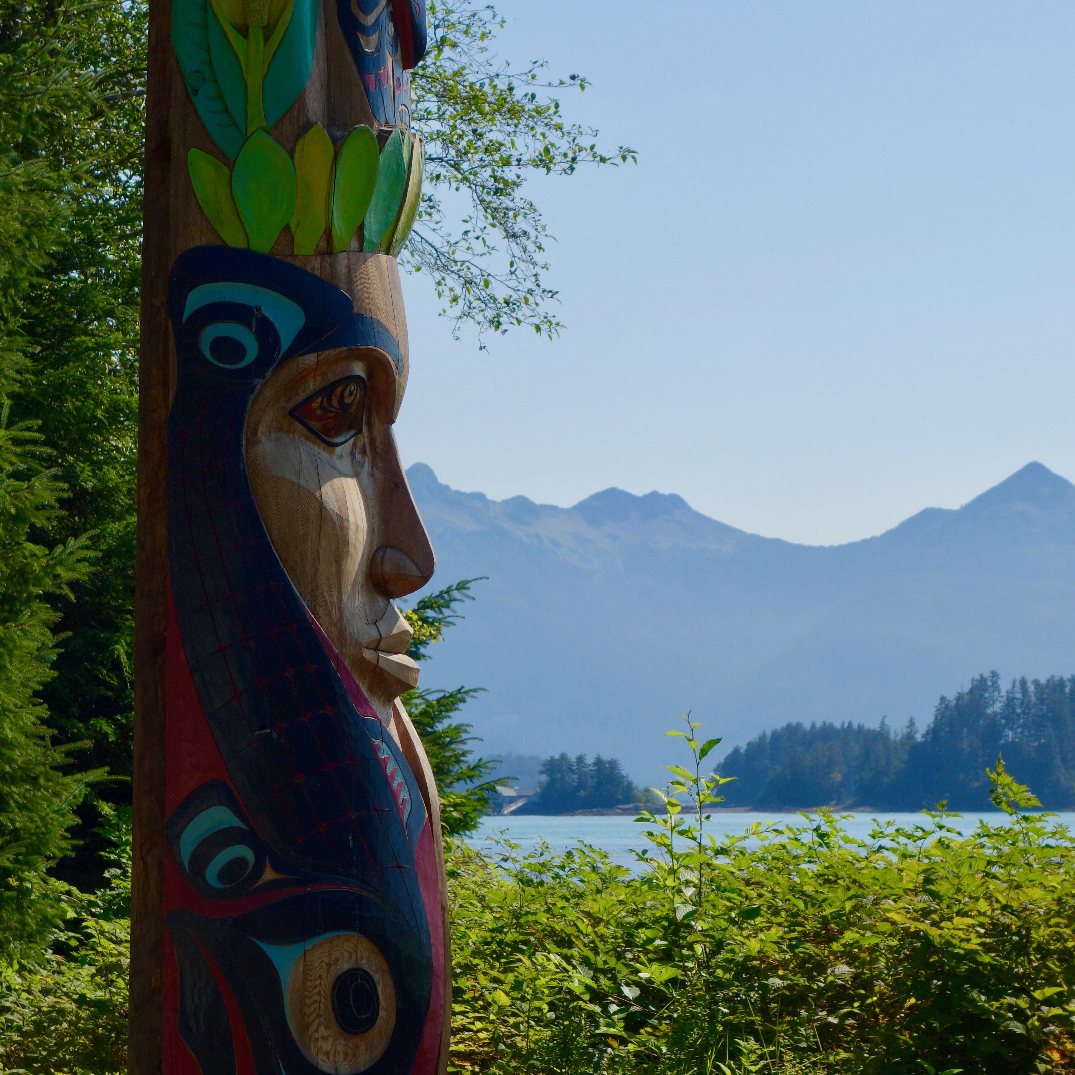 Tlinget Totem Pole park which is in the Sitka National Historical Park.  Sitka, Alaska.