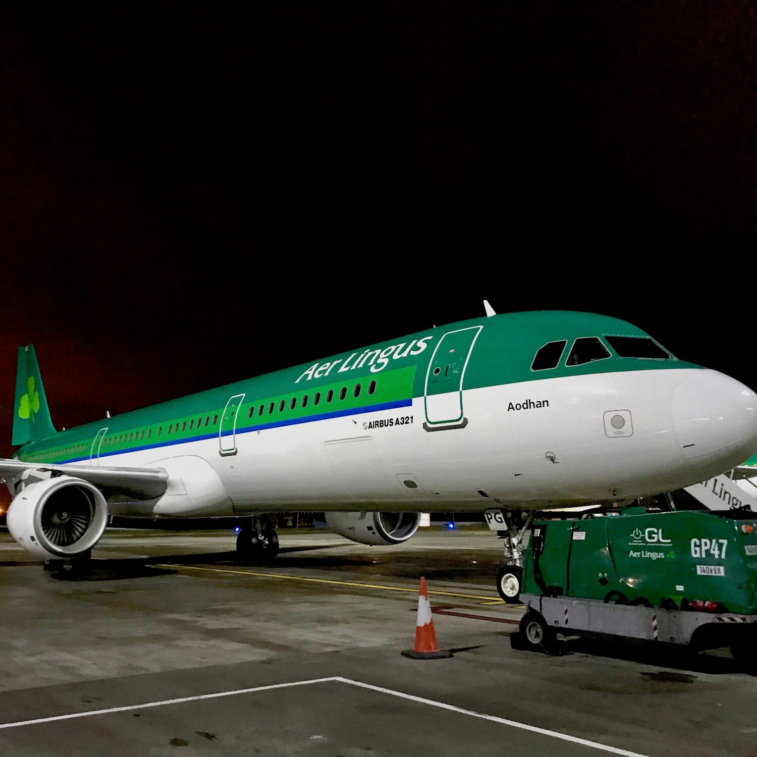 Aer Lingus A321 aircraft on the ramp in Dublin, Ireland. The nose of the plane shows the Irish name Aodhan.