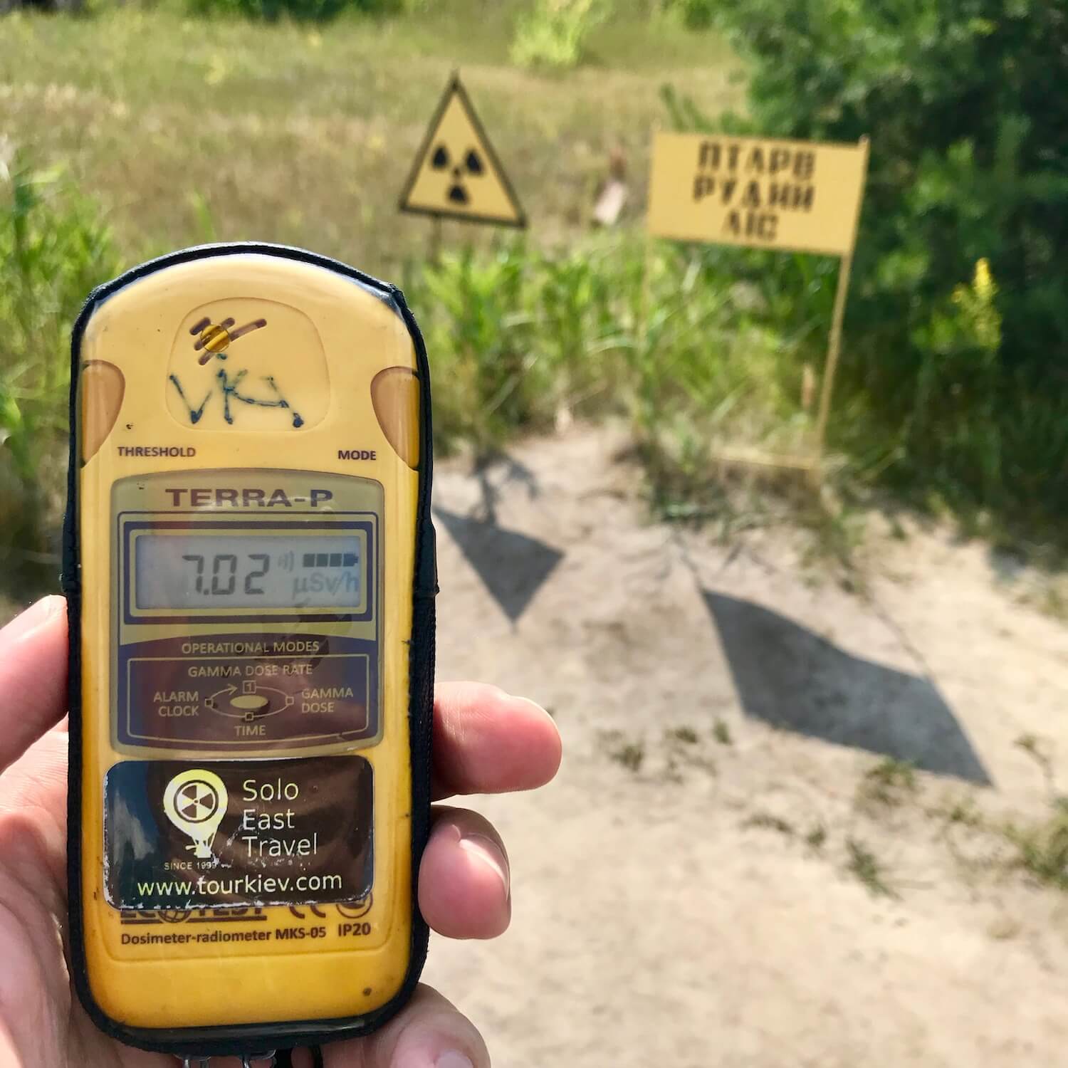 As part of the tour to the Chernobyl Exclusion Zone we were provided yellow Geiger counters, which are about the size of a walkie talkie. The counters pick up radiation in the area and provide a digital number to indicate the levels of radiation. The number on this Geiger counter reads 7.02. The location of this reading is above the red forest, which is where all the contaminated trees were buried.