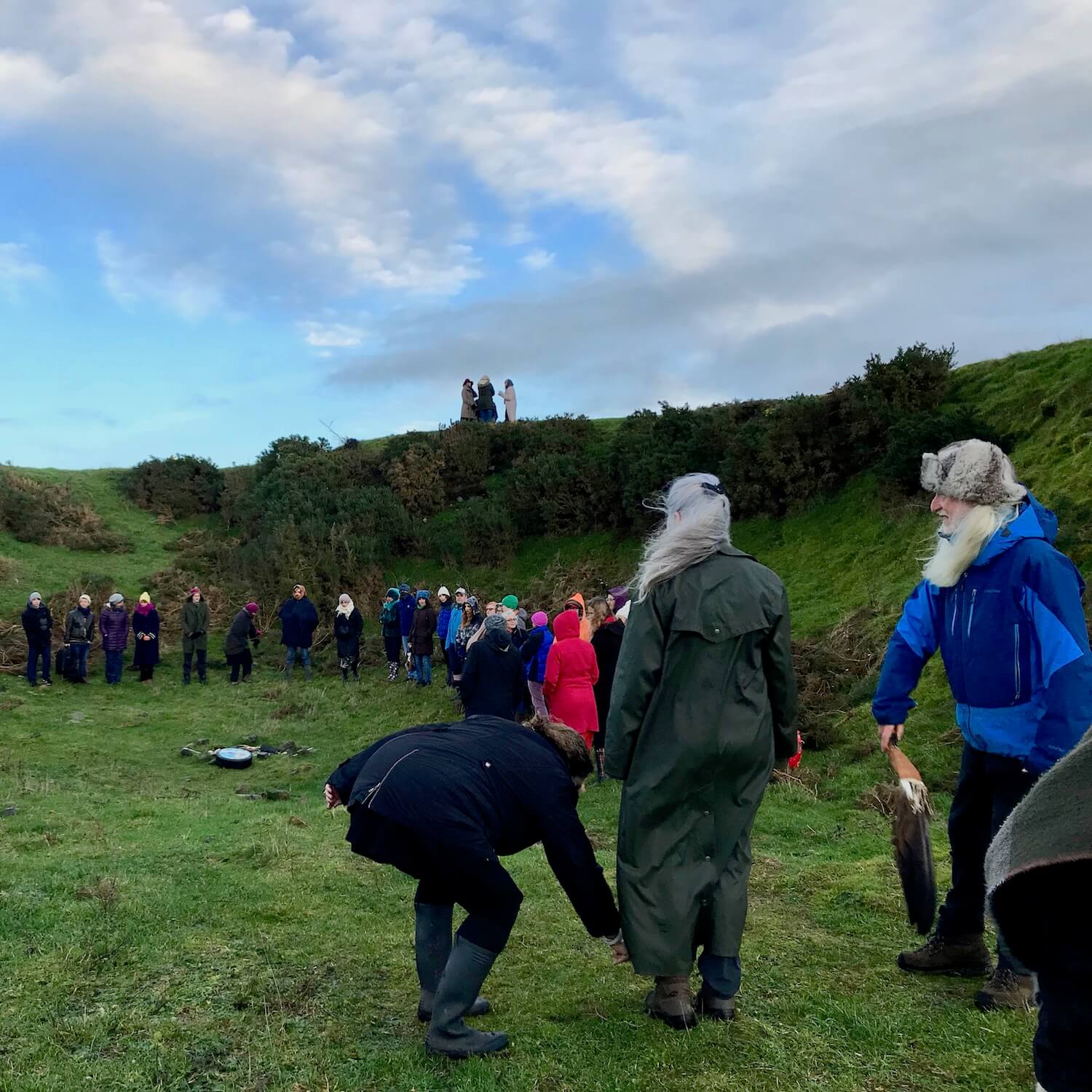 Shamen cleanse participants at the sunset ceremony in the middle of the mound at Dowth, which is a mile away from Newgrange in Ireland. The ceremony marks the start of the longest night of the year.