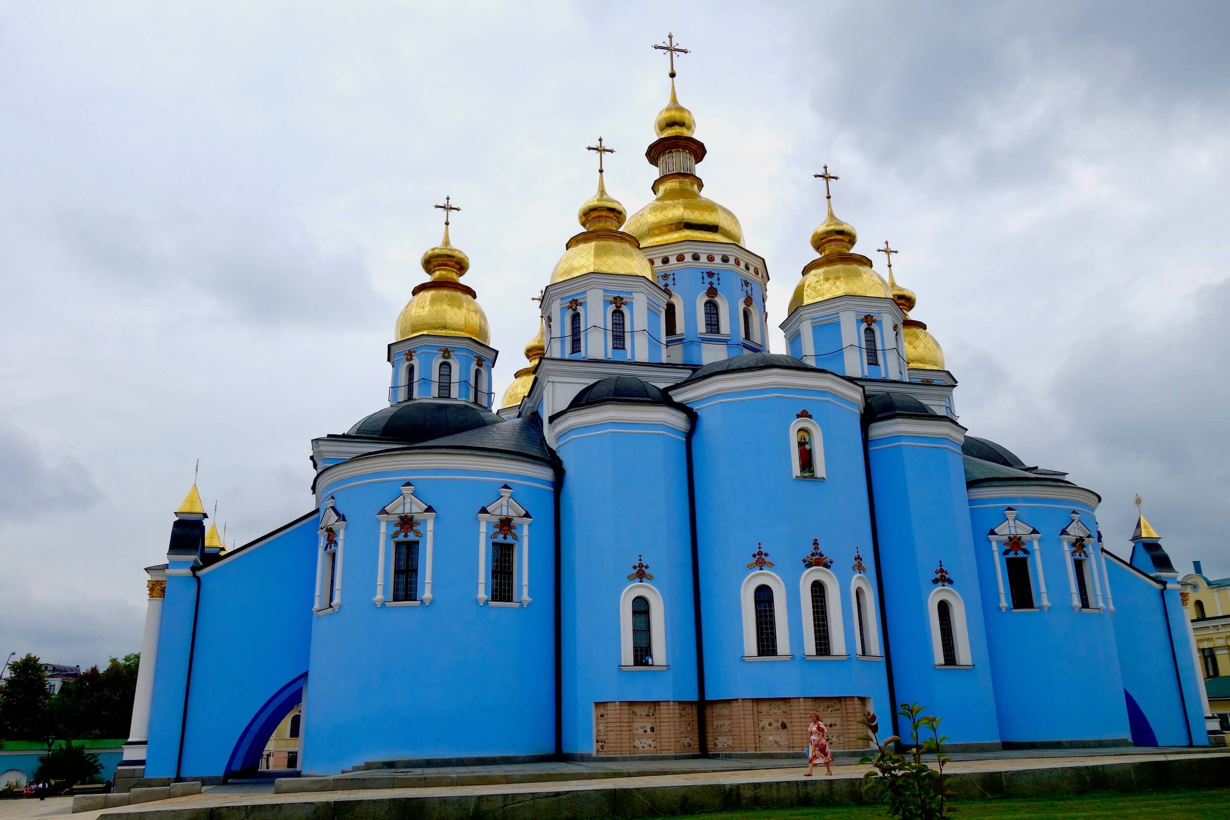 The main church in the complex at St. Michael's Monastery is alive with bright blue walls and shiny golden spires.