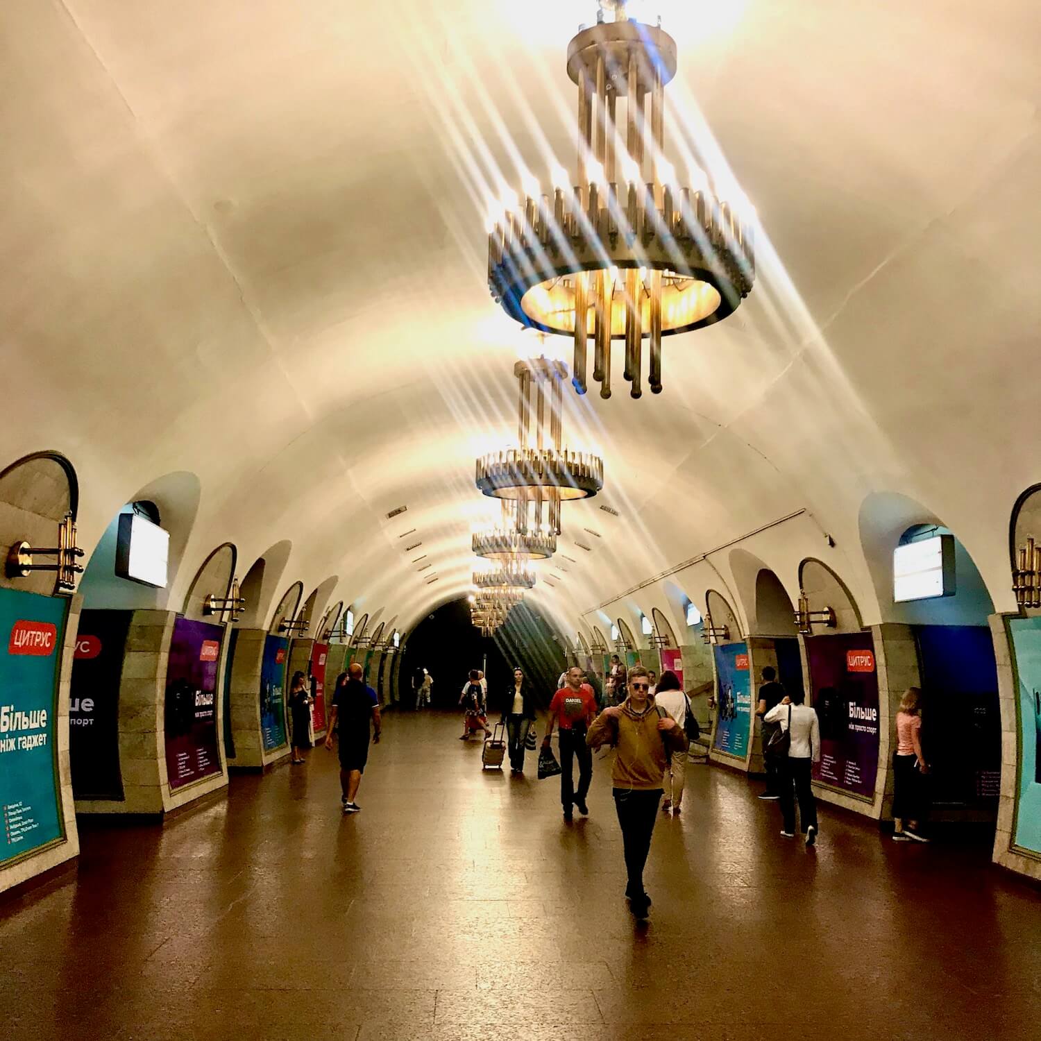 A beautiful soviet era deco styled subway station in Kiev.
