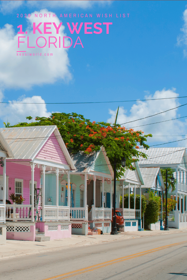 Number one on the 2020 global wish list, for the North American portion is Key West, Florida and this photo shoes a row of brightly colored houses with a blue sky.