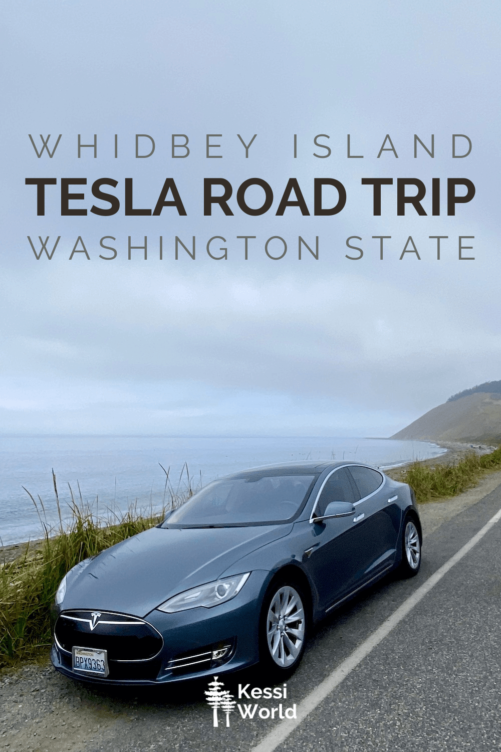 Pinterest tiles of a gray Tesla sits on the side of a road just on the edge of a bank leading down to a beach on Whidbey Island in the middle of the Puget Sound