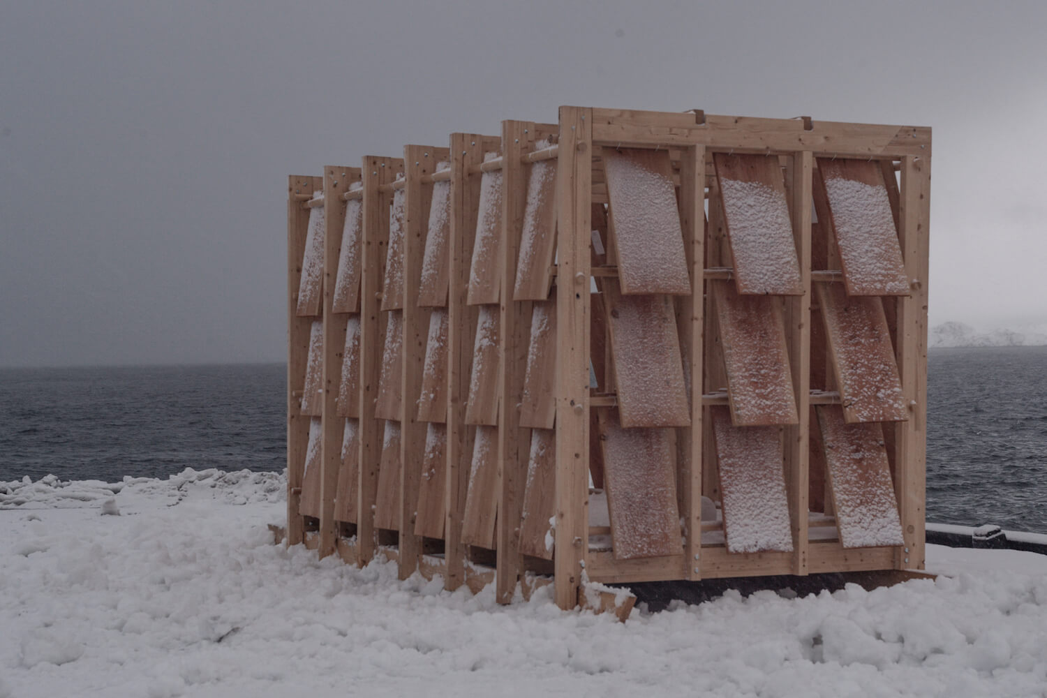 Qamutit Sled House sits near the harbor, covered with a dusting of snow in Nuuk, Greenland.