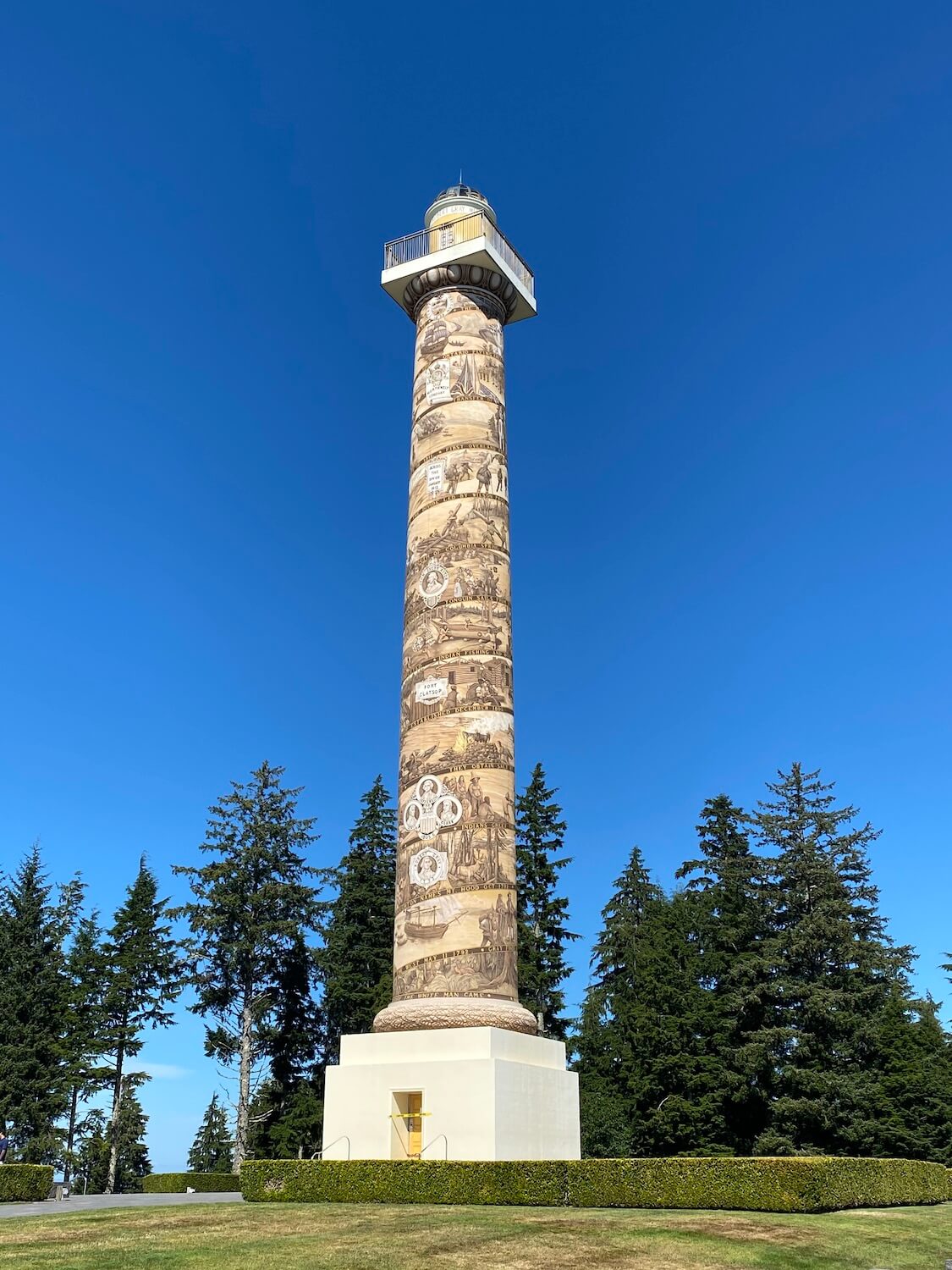 One of the most memorable things to do in Astoria Oregon is climb the many steps to the top of the Astoria Column, overlooking water on three sides.  The column rises up from a granite base with murals etched into the side depicting the early history of this city. 