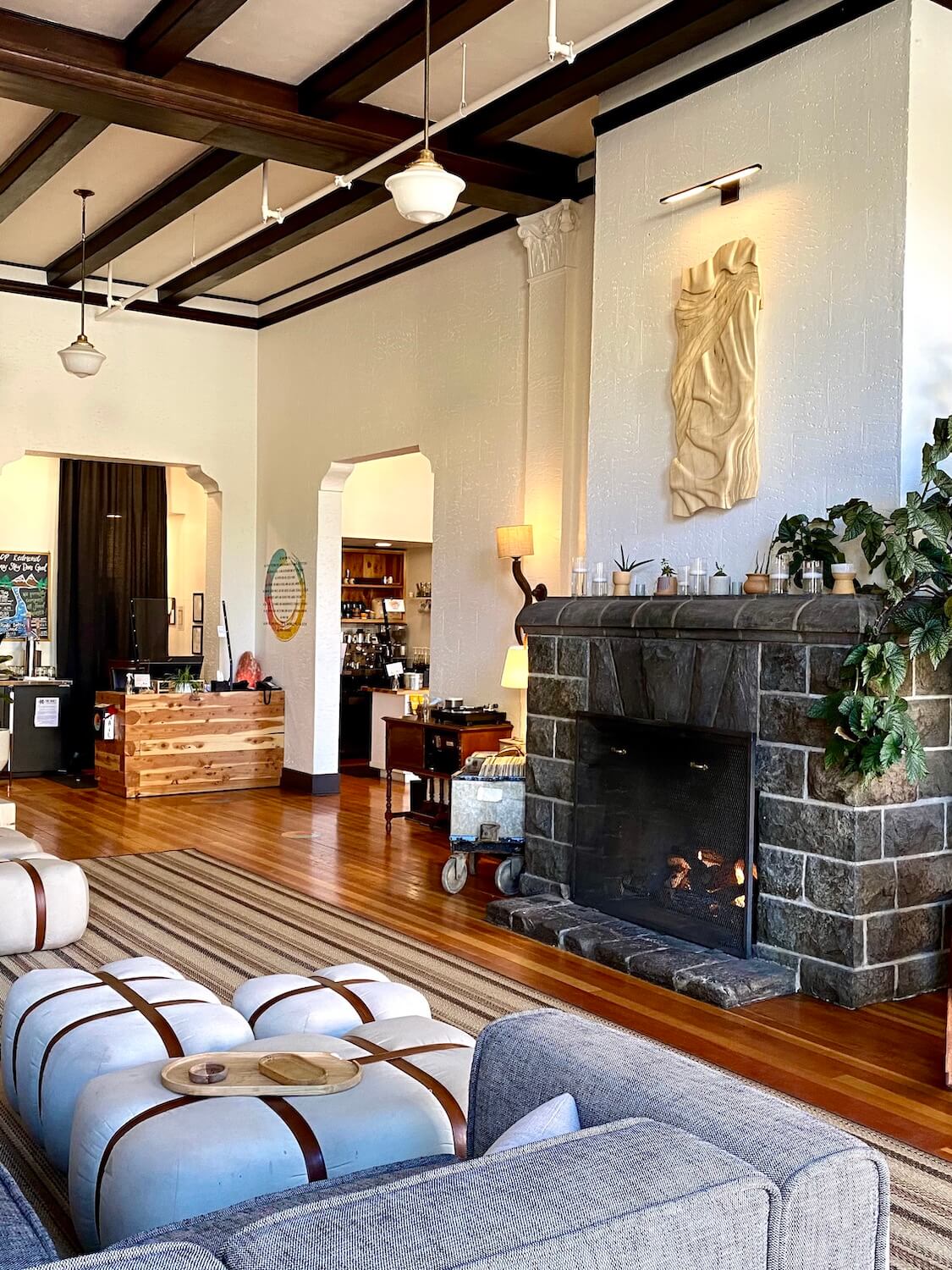 The lobby of the SCP Hotel Redmond combines historic features with hip furnishings amongst a large stone fireplace and comfy overstuffed couches.  This hotel makes for a great place to stay while on a weekend getaway to Central Oregon. 