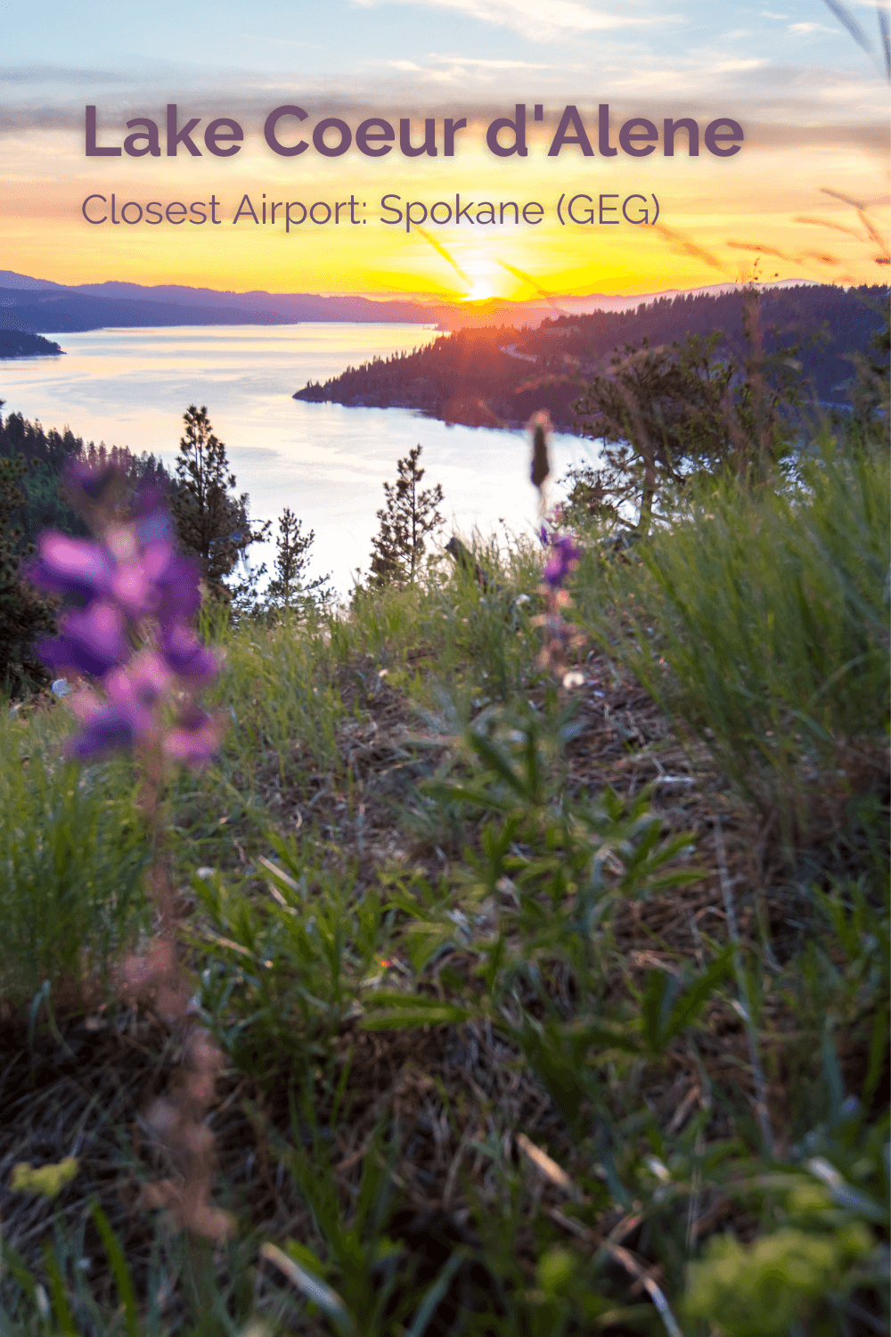 Lake Coeur d'Alene is beautiful at sunset and this shot shows the viewpoint from atop a forested mountain with the lake below winding around more distant forests.  