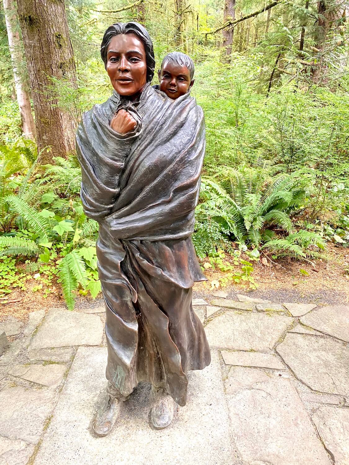 A statue of Sacagawea stands along an interpretive path at Fort Clatsop near Astoria.  This is an important place to visit to get a better understanding of the area on a weekend getaway. 