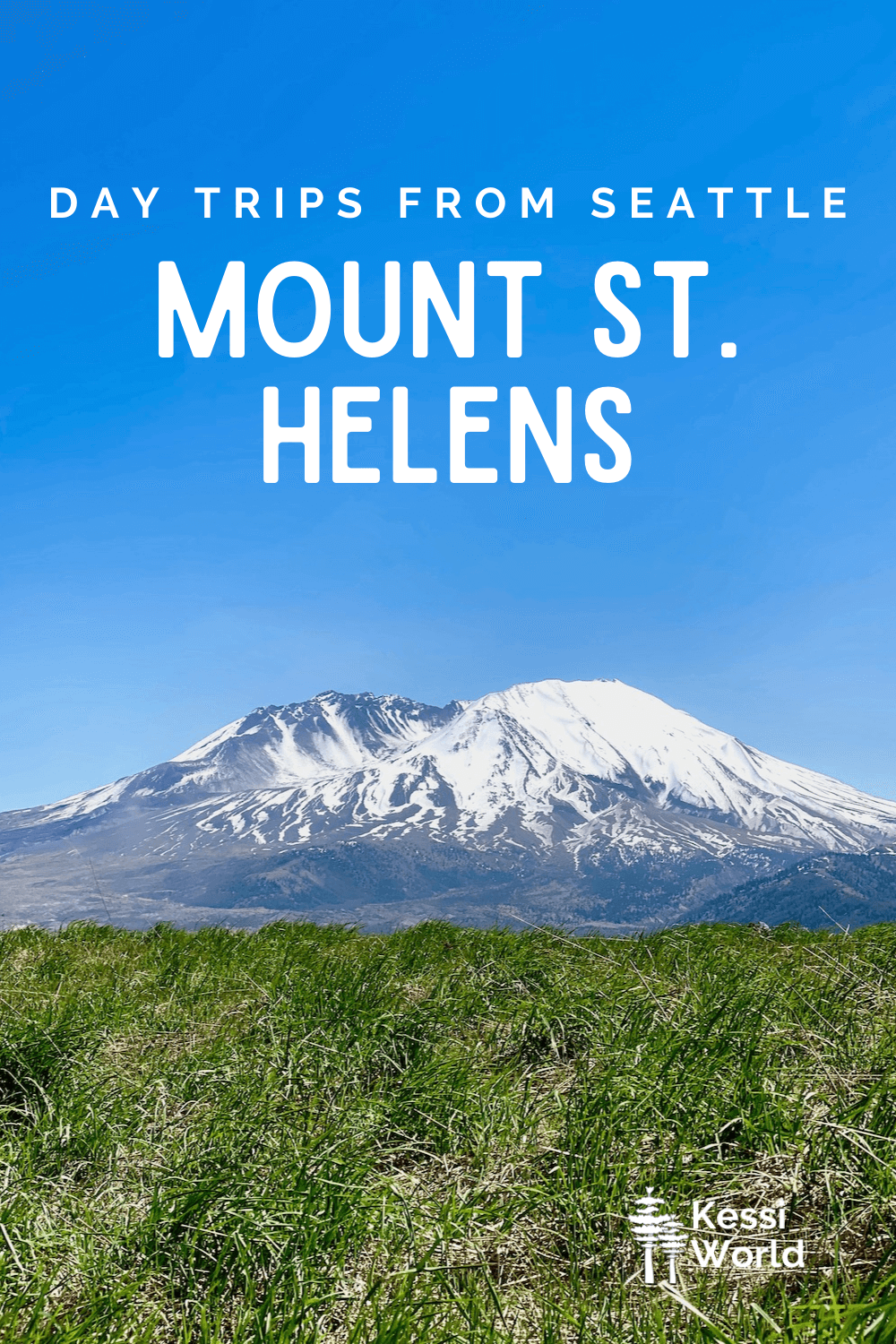 This Pinterest pin highlights one of a great list of day trips from Seattle. Here, a snow-covered Mt. St. Helens rises above a hill of green grass. The sky is blue and there are no clouds. The text on the photo is in white.