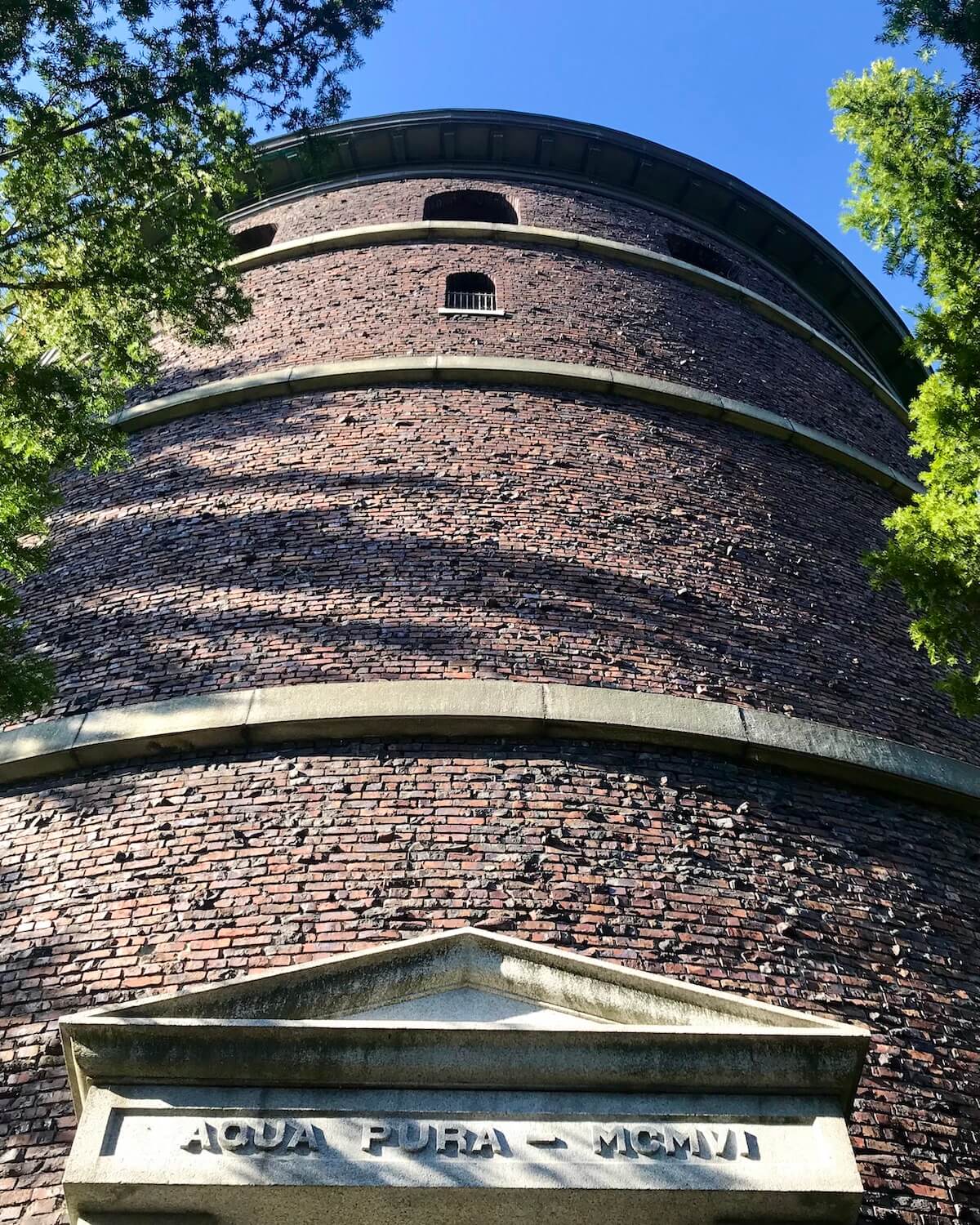 The water tower at Volunteer Park in Seattle represents the adjustment Archetype of the tarot.  Here the round building made from brick can be seen from the viewpoint of the entrance looking up. 