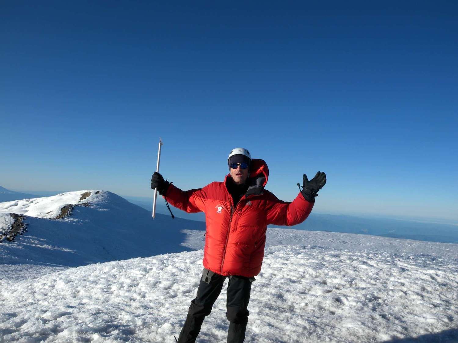 Matthew Kessi stands at the summit of Mt. Rainier
