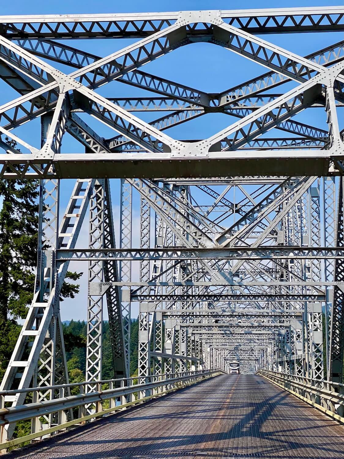 The metal structure of the bridge of the gods connects Cascade Locks, Oregon with Stevenson, Washington. This is the road trip itinerary to Spirit Lake on Mount St. Helens.