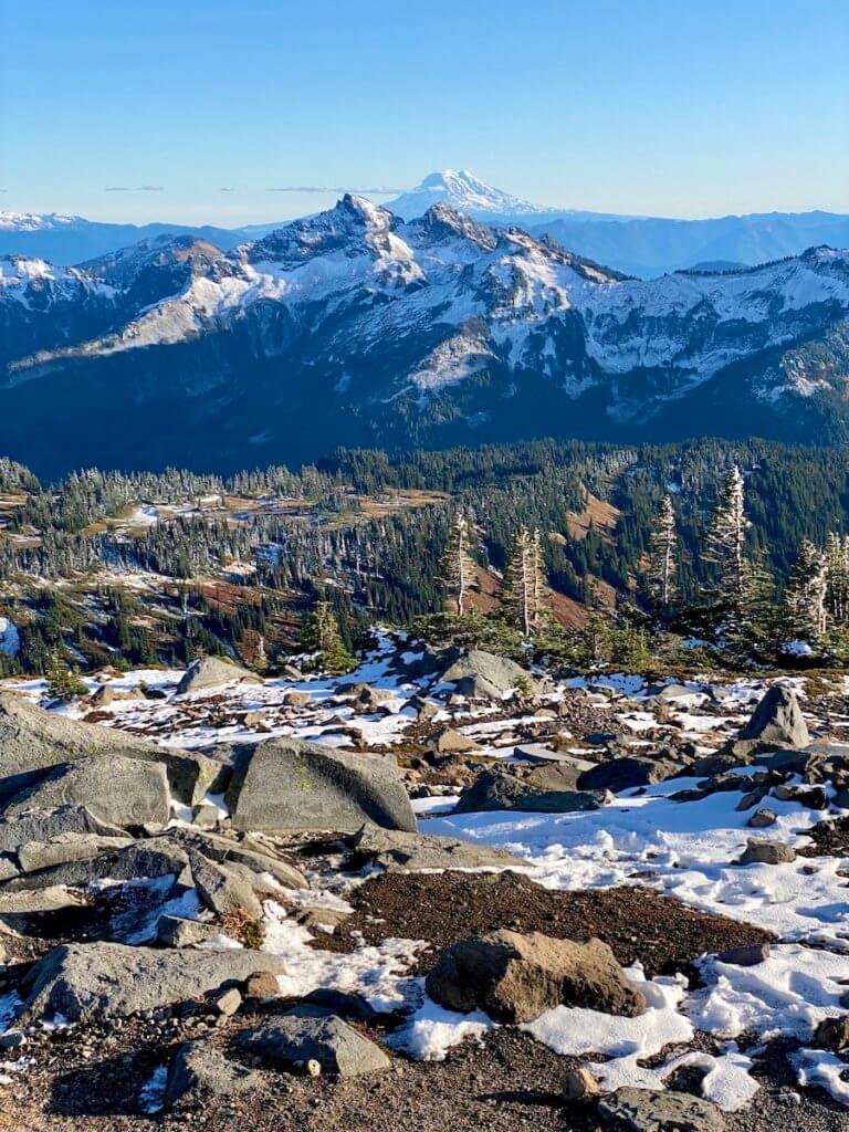 A view from Panorama Peak on Mt. Rainier shows Mt. Adams in the distance as well as other lower Cascade Mountain peaks.
