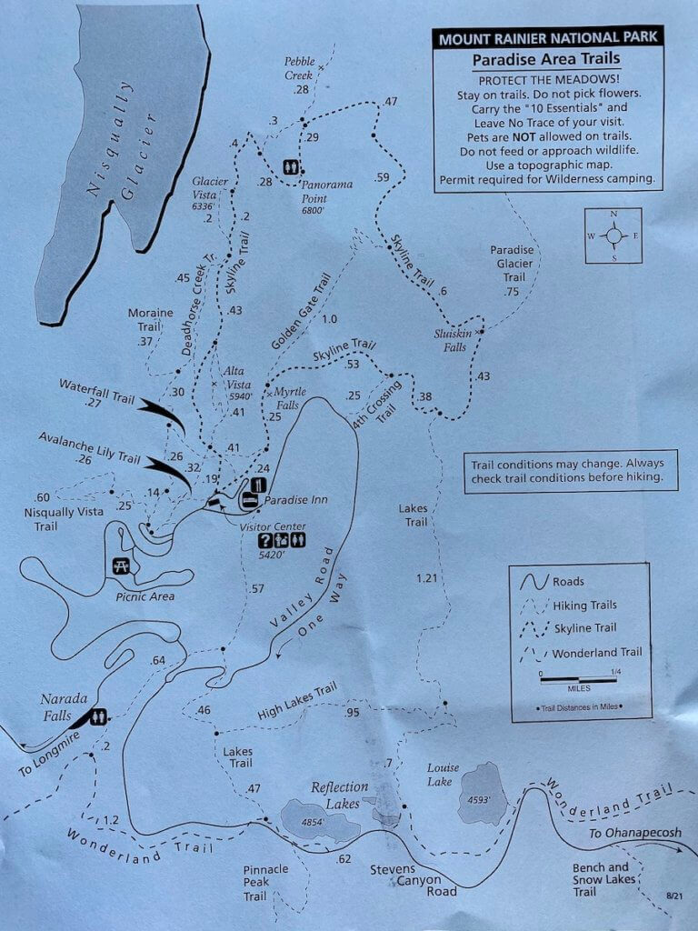 Map of hiking trails around Paradise on Mt. Rainier. The paper is blue with black print.