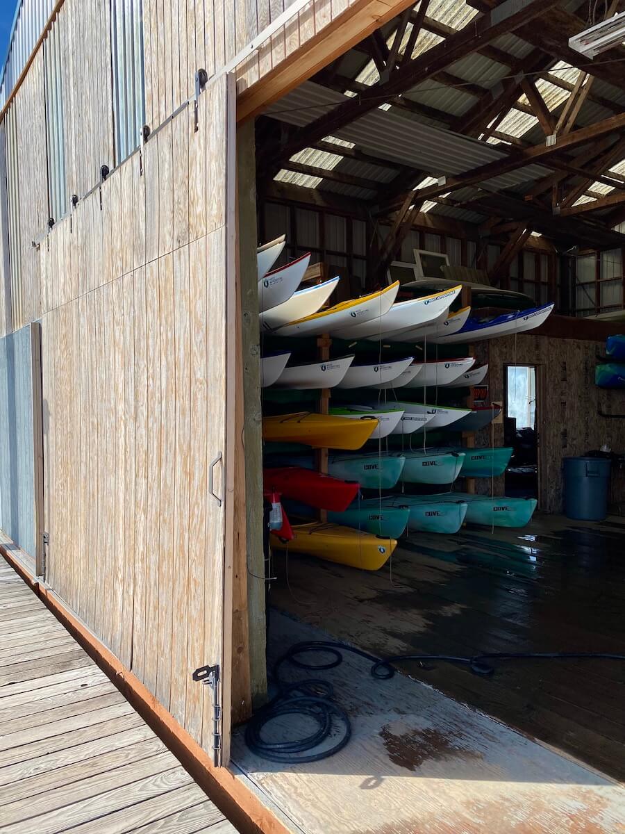 Shelves of kayaks are put away inside a dock building along the Columbia River near Scappoose Oregon.