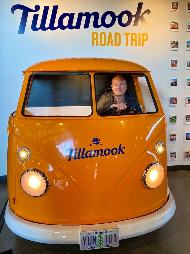 Matthew Kessi poses for a selfie while driving the loaf mobile at Tillamook Creamery in Tillamook Oregon.