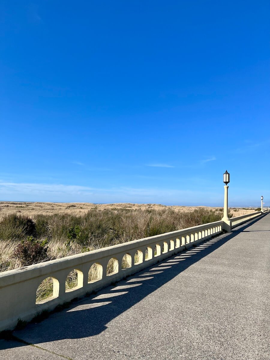 The boardwalk in Seaside Oregon is a great thing to do, walking the 1.5 mile stretch that is flat pavement with historic lamp posts and rolling sand dunes.
