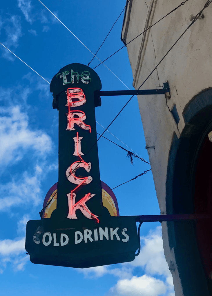 A red neon sign for the Brick bar and grill in Roslyn, Washington.