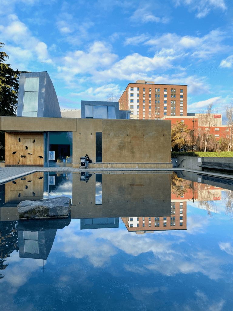 The church of St. Ignatius on Capitol Hill in Seattle is an interesting architecture icon. The reflection pond shows off the brilliant blue fall sky.